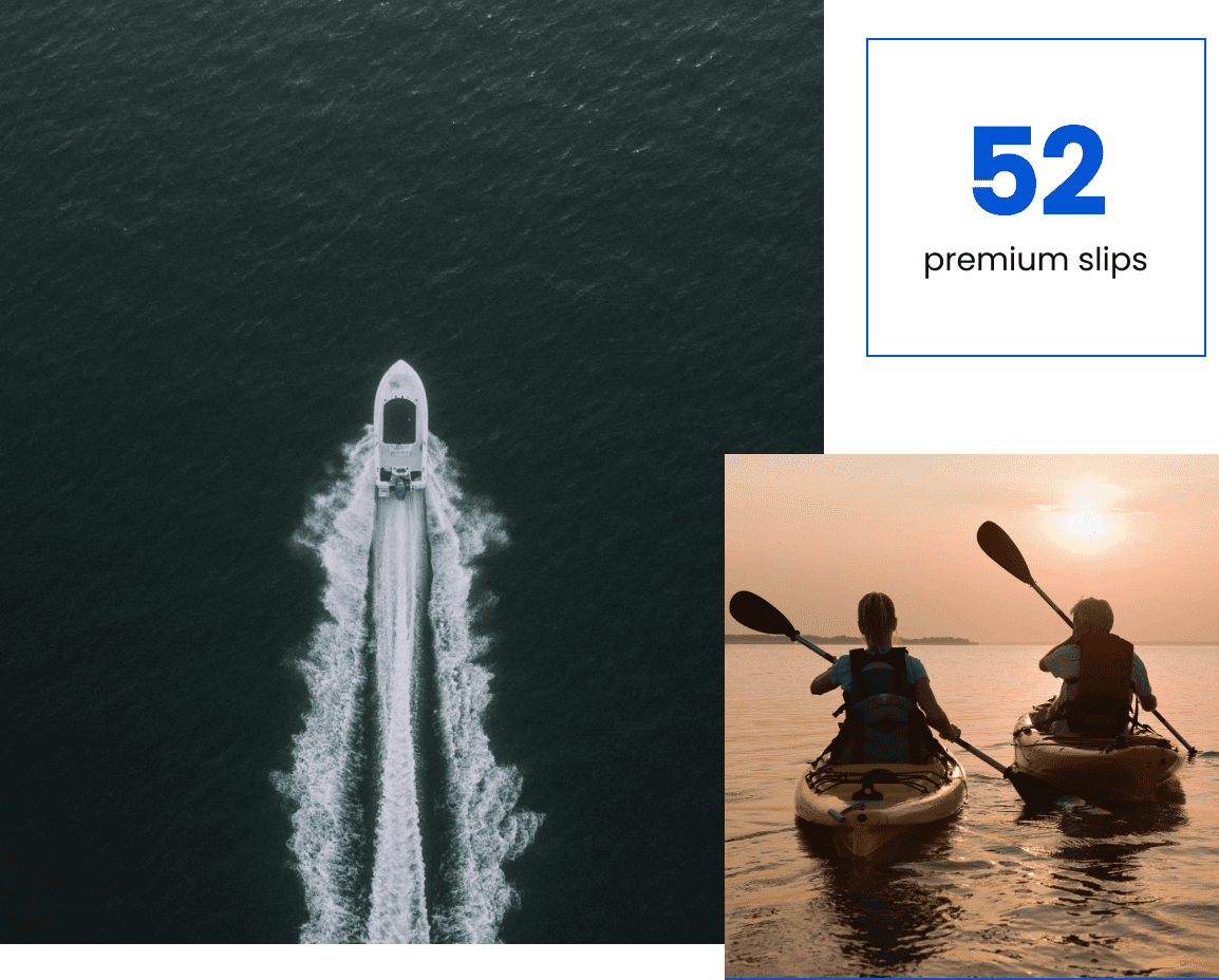 A boat is sailing in the water and two people are kayaking.